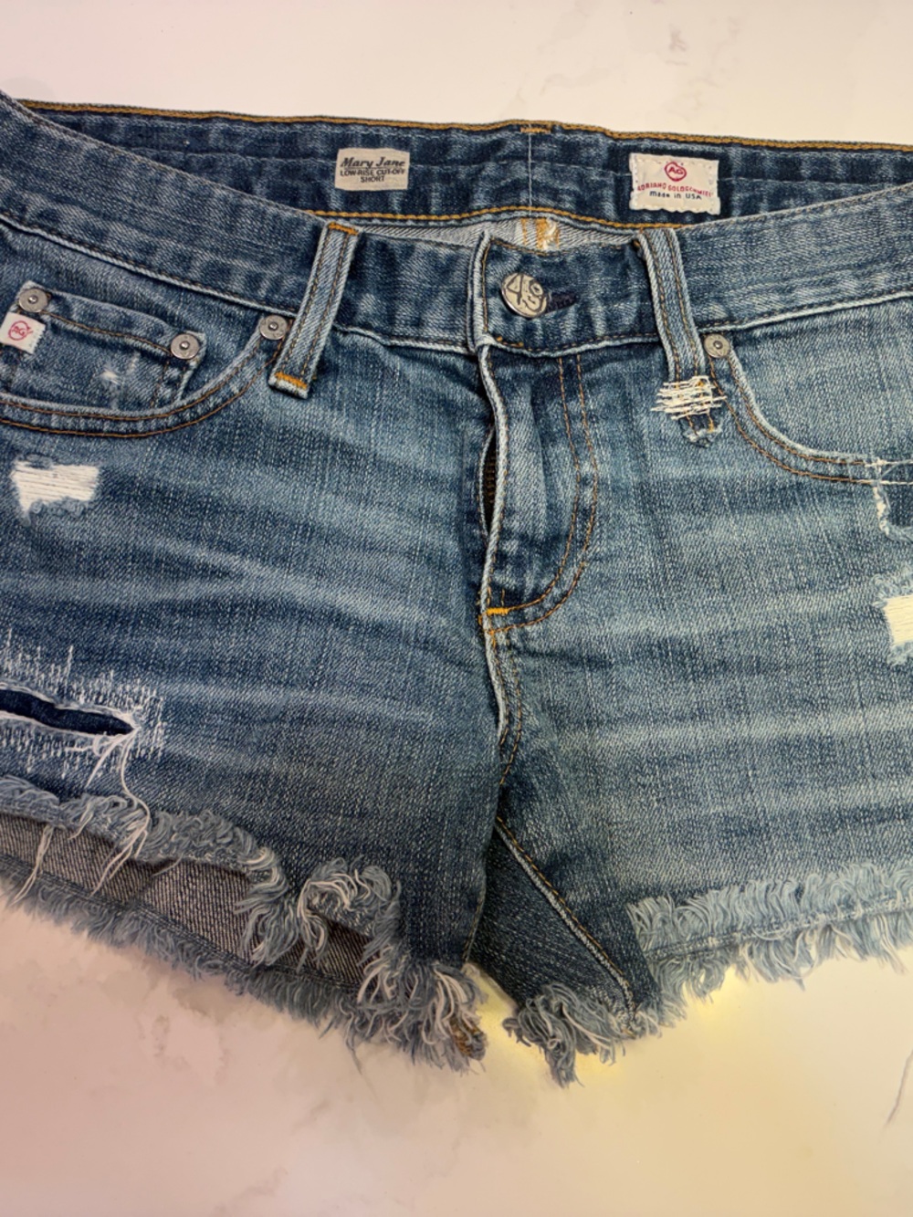 AG MARY JANE low rise cut off short Women’s Distressed Denim Shorts — Blue